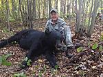 Mark Sundeen with 412# black bear hunted with hounds. Yellow River Flyway LLC