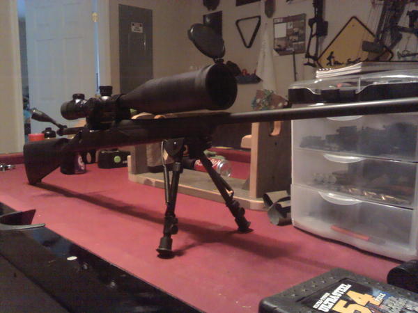 My Remington 700 Adl 7mm Rem Mag myself custom, i did the bolt knob, has an aluminum bed block, barrel action and bolt were all restored with thick teflon reducing resonance in the barrel,pic rail, Barska SWAT 30mm 6-24X60IR 1/8in. MOA adjustments side parallex mil-reticle and a 6 in sun shade, bipod, timney trigger pulls 2.9 lbs. the forend of the stock was re inletted which made the barrel 100% free floating to the block and took 7 oz off. Sweet shooting gun. Shoots Berger 168g Hunting VLD's...