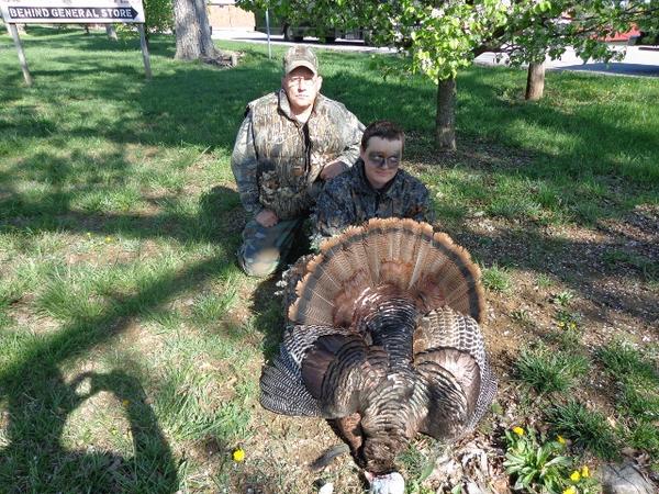 008 (640x480) (2) (640x480) This is my Buddy Kent,he called in this bird for Seth the Brother of John my 2013 Youth Hunter. His was a good one to for a first time hunter. 20lbs. 9" Beard and 1' Spurs. We had a great time and good success on these hunts.
