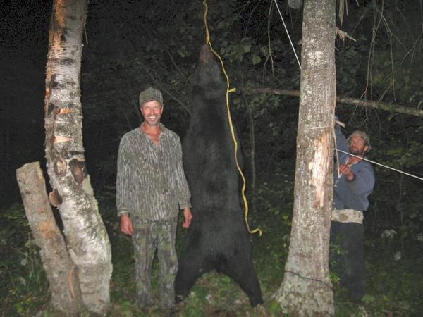 A good friend of mine In our little bear hunting group with a nice P&Y bear. Skull measured out at 19 7/16 P&Y.